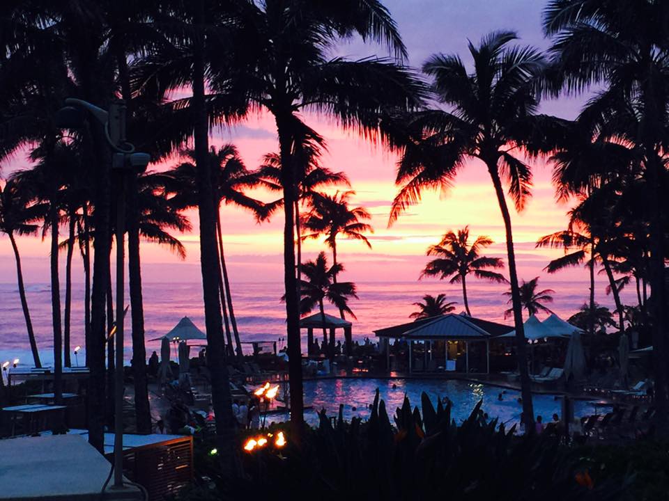 A sunset at The Point Sunset & Pool Bar at Turtle Bay Resort