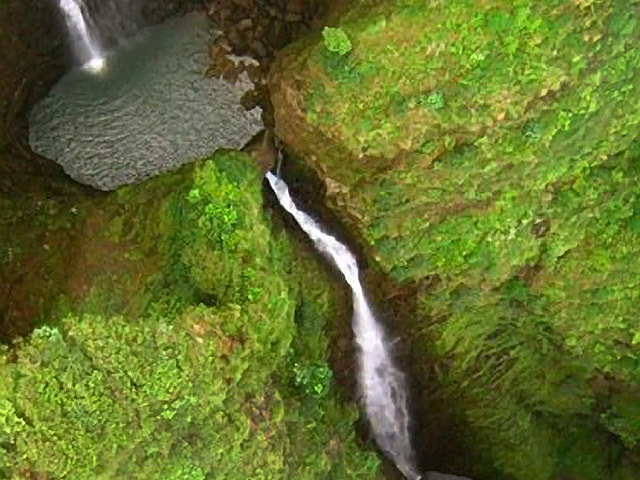 An aerial view of a Hawaiian waterfall