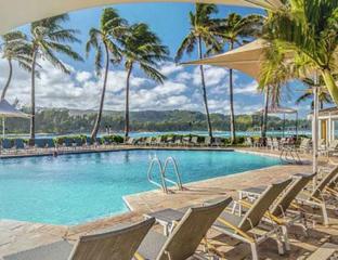 pool with lounge chairs