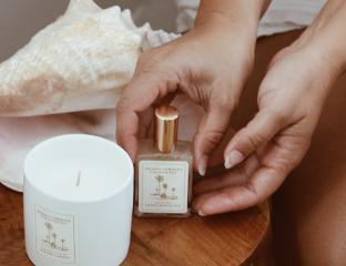 Holding Perfume & Candle
