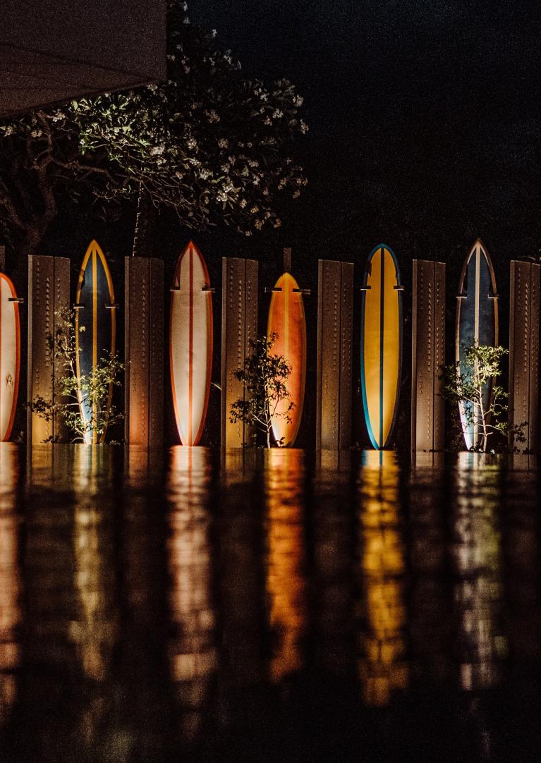 Lobby surfboards at night