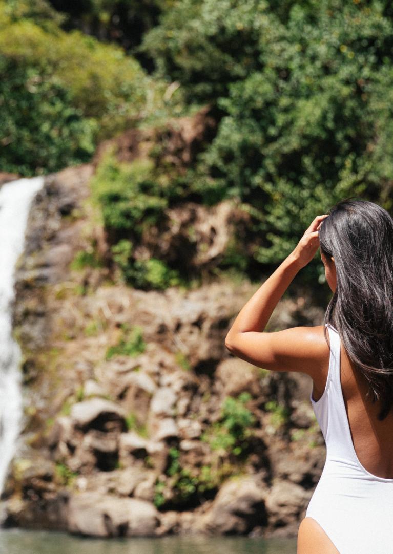 Woman at waterfall