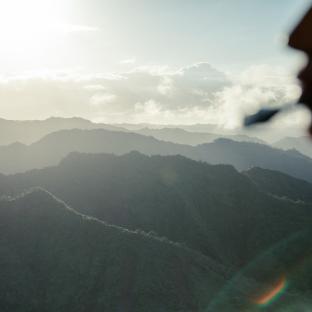 helicopter over mountains